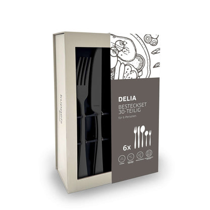 Das Edelstahl-Besteckset für sechs Personen, das „DELIA Besteckset 30-teilig PVD schwarz“ von Kuppels Home, umfasst Gabeln, Messer und Löffel in einem eleganten, modernen Design mit einer auffälligen schwarzen PVD-Beschichtung. Die stilvolle, teilweise illustrierte Verpackung verleiht Ihrer Tischdekoration eine raffinierte Note.