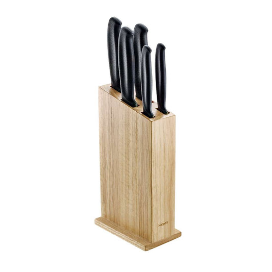 Der Kuppels BASIC Messerblock 5-teilig fasst fünf Küchenmesser unterschiedlicher Größe mit schwarzem Griff, die aufrecht auf weißem Untergrund stehen.